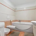 V * Žbandaj
